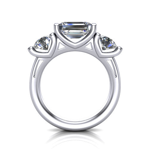 Elianna emerald three stone engagement ring in 18K White Gold, through-finger front profile showing the bar-set three-stone head raised above the smooth band