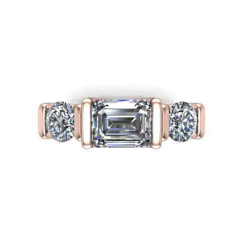 Elianna emerald three stone engagement ring in 14K Rose Gold, top-down view showing the three round diamonds held in vertical bar settings from above