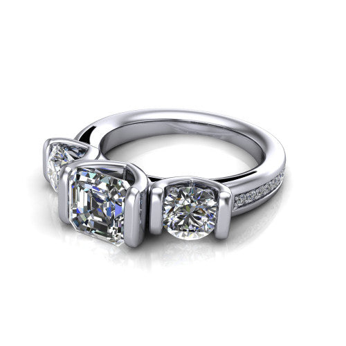 Fatima square emerald three stone engagement ring in Platinum, three-quarter perspective showing the round center between two round side stones in bar settings above a pav&eacute; band
