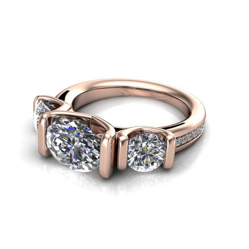 Fatima oval three stone engagement ring in 18K Rose Gold, three-quarter perspective showing the round center between two round side stones in bar settings above a pav&eacute; band