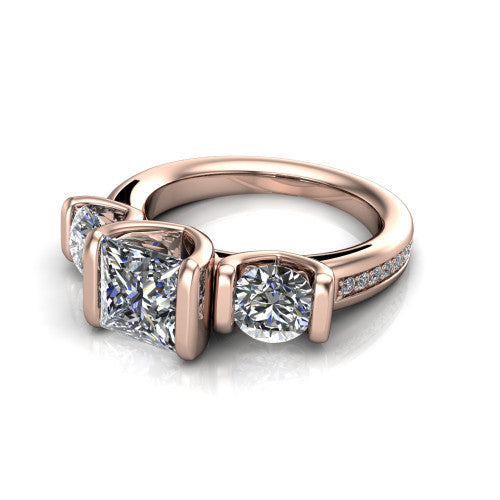 Fatima princess three stone engagement ring in 14K Rose Gold, three-quarter perspective showing the round center between two round side stones in bar settings above a pav&eacute; band