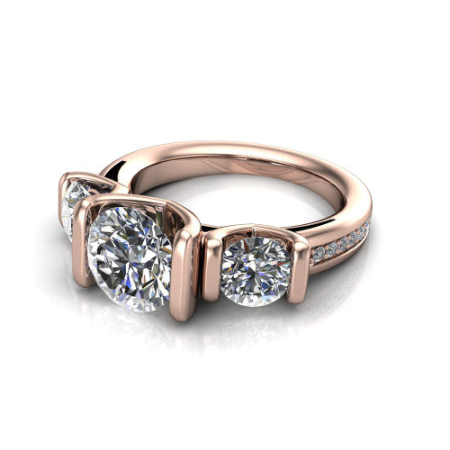 Fatima round three stone engagement ring in 18K Rose Gold, three-quarter perspective showing the round center between two round side stones in bar settings above a pav&eacute; band