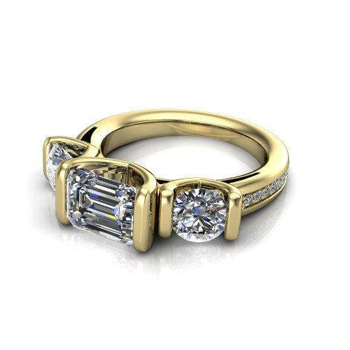 Fatima emerald three stone engagement ring in 14K Yellow Gold, three-quarter perspective showing the round center between two round side stones in bar settings above a pav&eacute; band