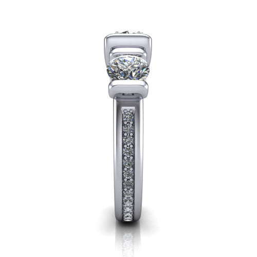 Fatima oval three stone engagement ring in 14K White Gold, side profile showing the pav&eacute; running down the band and the bar-set side stones in profile