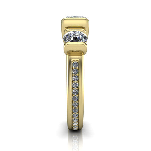 Fatima cushion three stone engagement ring in 14K Yellow Gold, side profile showing the pav&eacute; running down the band and the bar-set side stones in profile