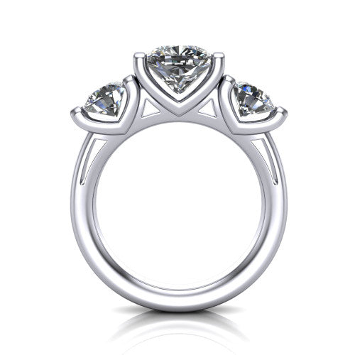 Fatima cushion three stone engagement ring in Platinum, through-finger front profile showing the bar-set three-stone head raised above the pav&eacute; band