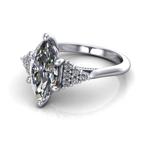 Raya marquise three stone engagement ring in Platinum, three-quarter perspective showing the center stone flanked by a trio diamond cluster on each shoulder above a slim milgrain band