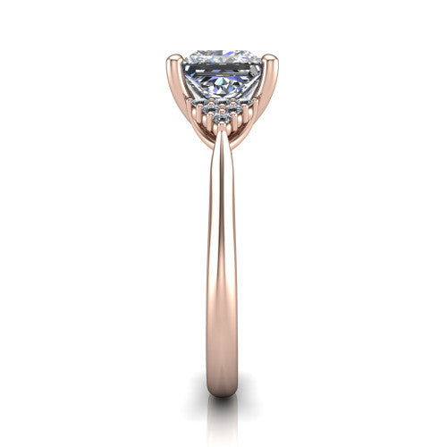 Raya princess three stone engagement ring in 18K Rose Gold, side profile showing the slim milgrain cathedral band and the side clusters in profile