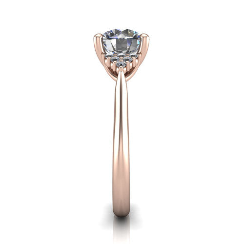 Raya round three stone engagement ring in 14K Rose Gold, side profile showing the slim milgrain cathedral band and the side clusters in profile