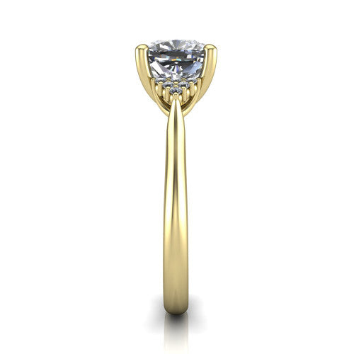 Raya cushion three stone engagement ring in 14K Yellow Gold, side profile showing the slim milgrain cathedral band and the side clusters in profile