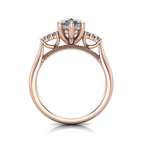 Raya pear three stone engagement ring in 14K Rose Gold, through-finger front profile showing the four-prong center raised above the cathedral band with cluster shoulders