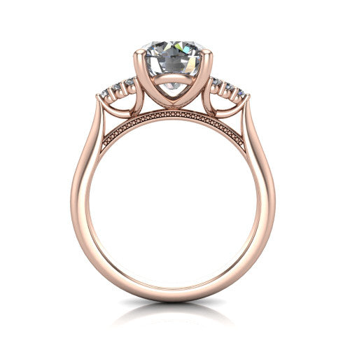 Raya round three stone engagement ring in 18K Rose Gold, through-finger front profile showing the four-prong center raised above the cathedral band with cluster shoulders