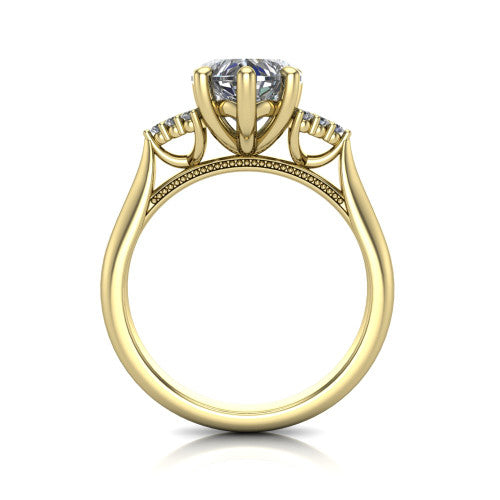 Raya heart three stone engagement ring in 14K Yellow Gold, through-finger front profile showing the four-prong center raised above the cathedral band with cluster shoulders