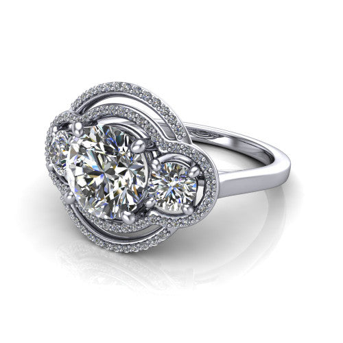 Elle round three stone halo engagement ring in 18K White Gold, three-quarter perspective showing the center stone flanked by two side stones in an interlocking double pav&eacute; halo above a tapered band