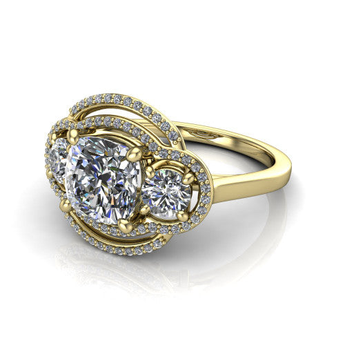 Elle cushion three stone halo engagement ring in 14K Yellow Gold, three-quarter perspective showing the center stone flanked by two side stones in an interlocking double pav&eacute; halo above a tapered band