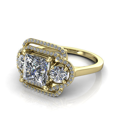 Elle princess three stone halo engagement ring in 14K Yellow Gold, three-quarter perspective showing the center stone flanked by two side stones in an interlocking double pav&eacute; halo above a tapered band