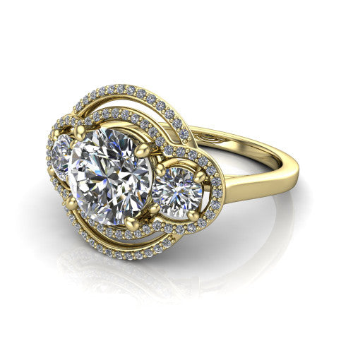 Elle round three stone halo engagement ring in 18K Yellow Gold, three-quarter perspective showing the center stone flanked by two side stones in an interlocking double pav&eacute; halo above a tapered band