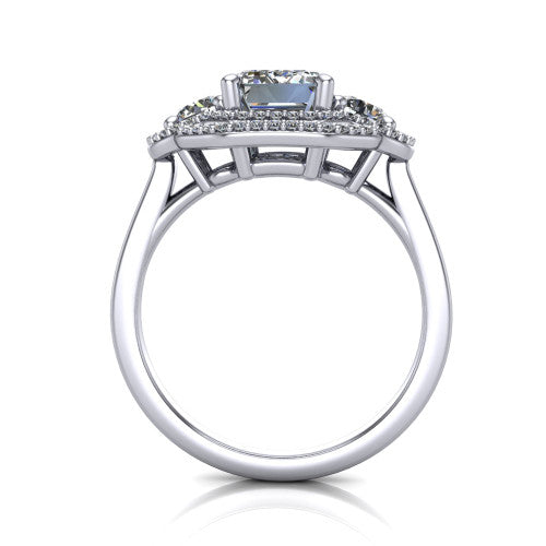 Elle emerald three stone halo engagement ring in 14K White Gold, through-finger front profile showing the haloed three-stone head raised above the cathedral shoulders