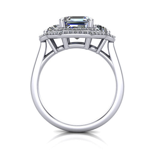 Elle square emerald three stone halo engagement ring in 18K White Gold, through-finger front profile showing the haloed three-stone head raised above the cathedral shoulders