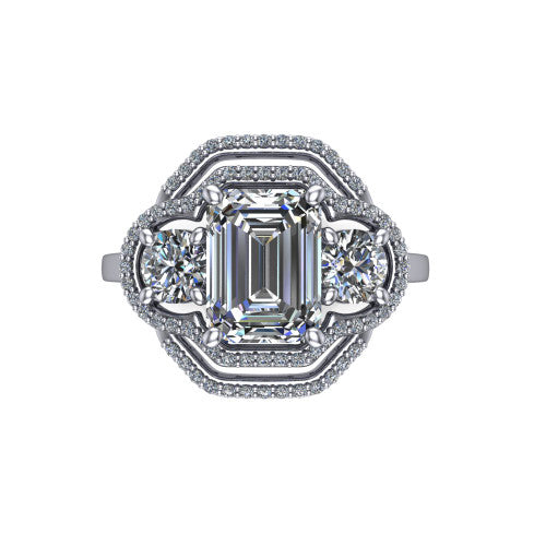 Elle emerald three stone halo engagement ring in Platinum, top-down view showing the three stones wrapped in a scrolling figure-eight pav&eacute; halo from above