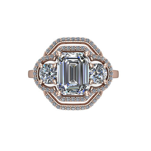 Elle emerald three stone halo engagement ring in 18K Rose Gold, top-down view showing the three stones wrapped in a scrolling figure-eight pav&eacute; halo from above