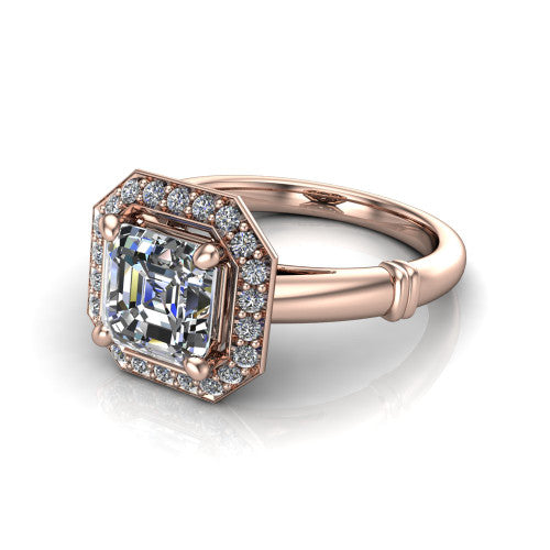 Miracle square emerald halo engagement ring in 18K Rose Gold, three-quarter perspective showing the haloed center above a plain band with a ribbed lower-shank accent