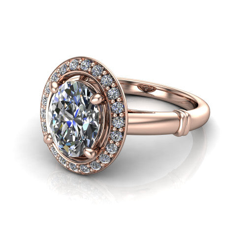 Miracle oval halo engagement ring in 18K Rose Gold, three-quarter perspective showing the haloed center above a plain band with a ribbed lower-shank accent