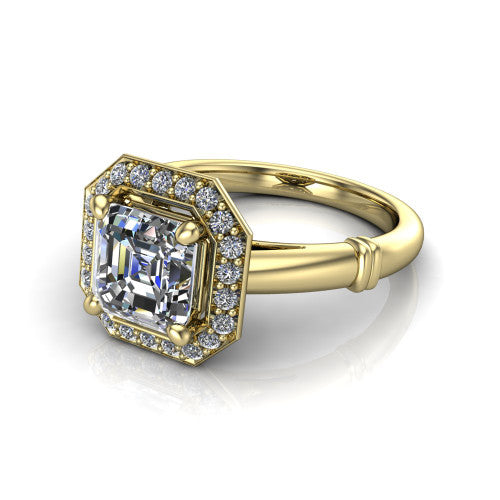 Miracle square emerald halo engagement ring in 18K Yellow Gold, three-quarter perspective showing the haloed center above a plain band with a ribbed lower-shank accent