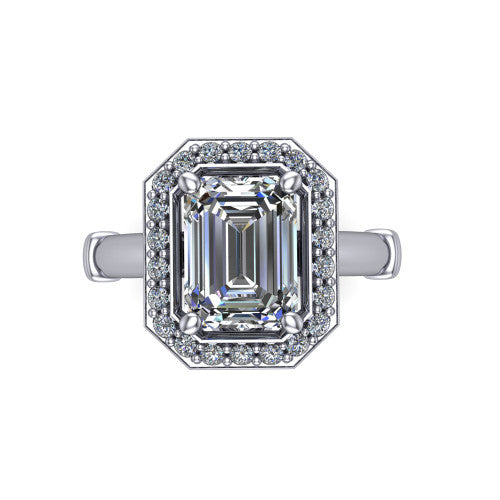Miracle emerald halo engagement ring in 18K White Gold, top-down view showing the center framed by a pav&eacute; halo with compass prongs