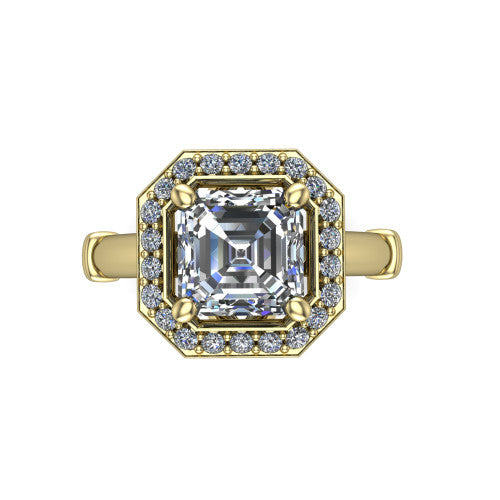 Miracle square emerald halo engagement ring in 14K Yellow Gold, top-down view showing the center framed by a pav&eacute; halo with compass prongs