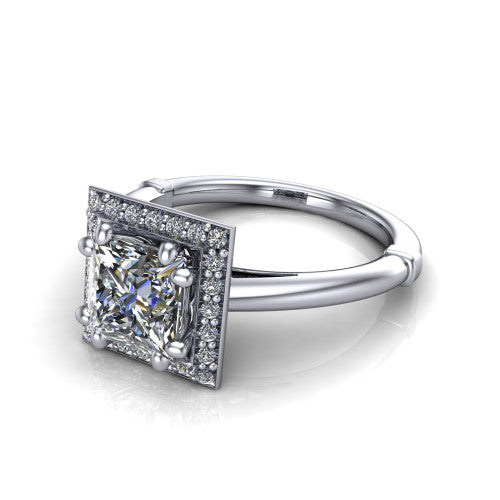 Journey princess halo engagement ring in 18K White Gold, three-quarter perspective showing the haloed center raised above a plain polished band