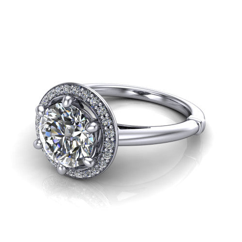Journey round halo engagement ring in Platinum, three-quarter perspective showing the haloed center raised above a plain polished band
