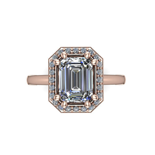 Journey emerald halo engagement ring in 14K Rose Gold, top-down view showing the center framed by a pav&eacute; halo with compass prongs