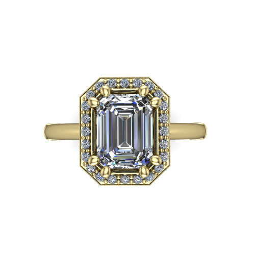 Journey emerald halo engagement ring in 14K Yellow Gold, top-down view showing the center framed by a pav&eacute; halo with compass prongs