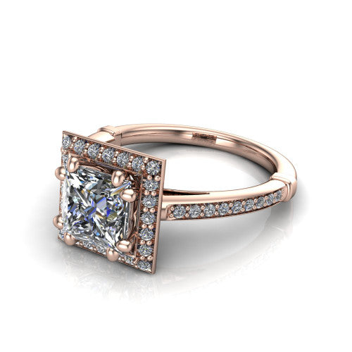 Alessandra princess halo engagement ring in 18K Rose Gold, three-quarter perspective showing the haloed center raised above a slim pav&eacute; band