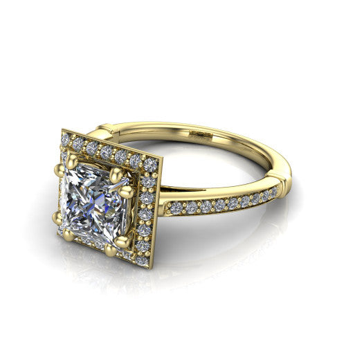 Alessandra princess halo engagement ring in 18K Yellow Gold, three-quarter perspective showing the haloed center raised above a slim pav&eacute; band