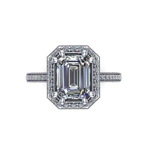 Alessandra emerald halo engagement ring in 14K White Gold, top-down view showing the center framed by a pav&eacute; halo with compass prongs