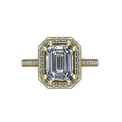Alessandra emerald halo engagement ring in 18K Yellow Gold, top-down view showing the center framed by a pav&eacute; halo with compass prongs