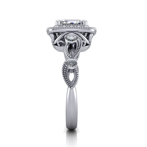 Lana square emerald halo engagement ring in 14K White Gold, side profile showing the open filigree undergallery and the bezel-set accent on the vintage leaf band