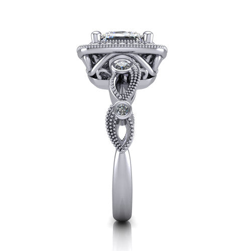 Lana princess halo engagement ring in Platinum, side profile showing the open filigree undergallery and the bezel-set accent on the vintage leaf band