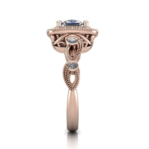 Lana cushion halo engagement ring in 18K Rose Gold, side profile showing the open filigree undergallery and the bezel-set accent on the vintage leaf band