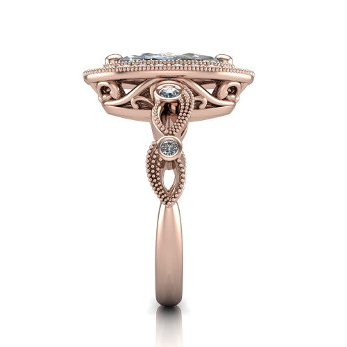 Lana marquise halo engagement ring in 14K Rose Gold, side profile showing the open filigree undergallery and the bezel-set accent on the vintage leaf band