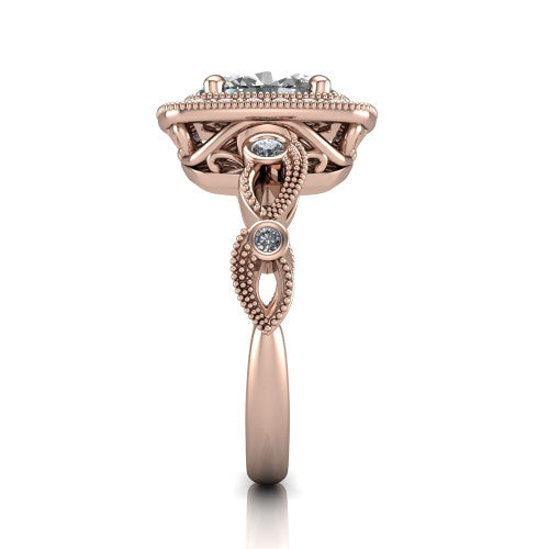Lana oval halo engagement ring in 14K Rose Gold, side profile showing the open filigree undergallery and the bezel-set accent on the vintage leaf band