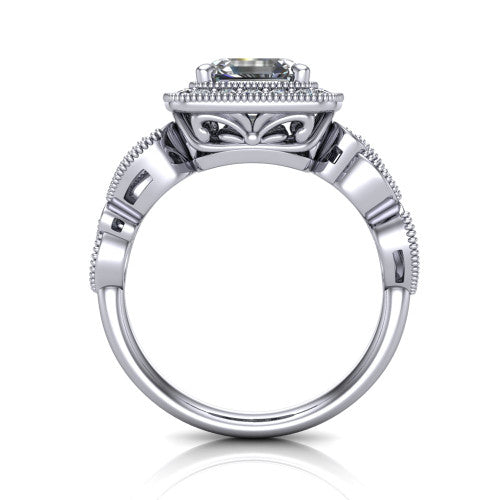 Lana square emerald halo engagement ring in Platinum, through-finger front profile showing the filigree scroll gallery beneath the halo and the marquise leaf shoulders