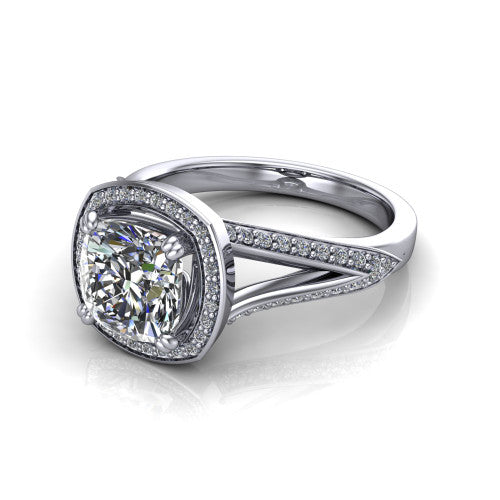 Antonella cushion halo engagement ring in Platinum, three-quarter perspective showing the haloed center raised above a split pav&eacute; shank