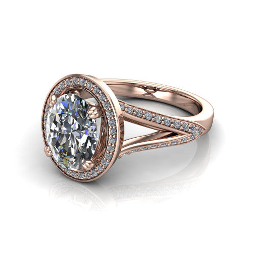 Antonella oval halo engagement ring in 14K Rose Gold, three-quarter perspective showing the haloed center raised above a split pav&eacute; shank