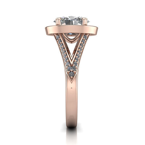 Antonella oval halo engagement ring in 18K Rose Gold, side profile showing the open cathedral gallery and the diamonds running down the split shank