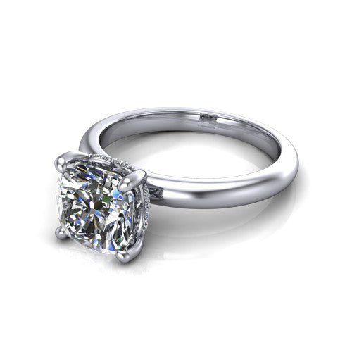 Ariel cushion classic engagement ring in 18K White Gold, three-quarter perspective showing the solitaire center diamond raised in four prongs above a slim polished band