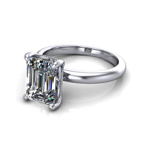 Ariel emerald classic engagement ring in Platinum, three-quarter perspective showing the solitaire center diamond raised in four prongs above a slim polished band