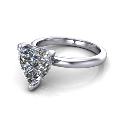 Ariel heart classic engagement ring in 14K White Gold, three-quarter perspective showing the solitaire center diamond raised in four prongs above a slim polished band